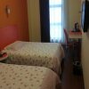 Отель Motel 168 Gao Qiao Ci Shan Inn в Шанхае