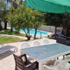 Отель House with exclusive pool and garden 7 min walk from the beach and the center, фото 15