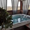 Отель Viksa with Hot Tub, фото 9