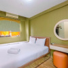 Отель Homey and Comfy 2BR Apartment @ Kebagusan City, фото 6