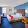 Отель Econo Lodge  Inn & Suites Lake Of The Ozarks, фото 44