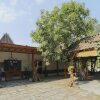 Отель Ndalem Joglo Krawitan Syariah, фото 18