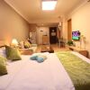 Отель Xinyuan Holiday Short Rental Apartment, фото 4