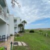 Отель Villas by The Sea Deluxe Two Bedroom Apartment, фото 30