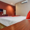 Отель OYO 3936 Hotel Trisula Makassar, фото 3