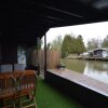 Отель Modern Chalet in a Small Park, Located Right Along a Fishing Pond, фото 4