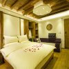 Отель Lijiang Happy Yufu Inn, фото 6