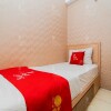 Отель RedLiving Apartemen Tamansari Panoramic Narel, фото 2