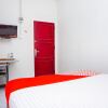 Отель OYO 433 Nelvi Guest House Syariah, фото 19