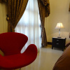 Отель The Executive Villa Inn & Suites, фото 4