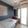 Отель Homey And Cozy Living Studio Amartha View Apartment, фото 5