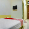 Отель OYO 91182 Kos'ta Homestay Makassar, фото 17