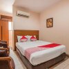 Отель OYO 919 Hotel Kalisma Syariah Near RS Pelni, фото 3