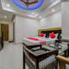 Отель OYO 18542 Petals Inn, фото 11