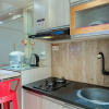 Отель Warm And Homey 2Br At Bassura City Apartment, фото 12