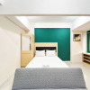 Отель Spacious Studio Room At Vida View Makassar Apartment, фото 2