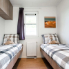 Отель Neatly furnished chalet with microwave, in a holiday park in a wetland area, фото 17
