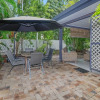 Отель Tropical Unit with Private Fenced Garden Close to The Beach 5, фото 11
