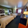 Отель Bluebird Day Inn & Suites, фото 29
