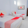 Отель OYO 421 Alianda Guest House Syariah, фото 5