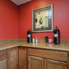 Отель HomeTowne Studios & Suites by Red Roof Bentonville, фото 18