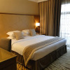 Отель Golden Tulip Suites Breida Al Q, фото 3