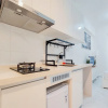 Отель Comfortable And Homey Studio At Sky House Alam Sutera Apartment, фото 1