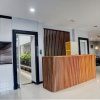 Отель SPOT ON 92822 Finest House Near Amplas Bus Terminal, фото 2