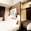 Отель Residence Hotel Hakata 12 в Хакате