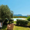 Отель The apartment with garden and sea view  has 1 double bedroom and a twin bedroom, a bathroom with sho, фото 2