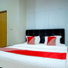 Отель OYO 90979 Ryfana Residence Syariah, фото 5