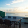 Отель Beachfront Penthouses at Brisas by The Spot, фото 36
