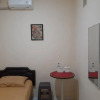 Отель Kost Carmelia Syariah Baranangsiang Bogor, фото 13