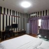 Отель Qingchengzhilian Apartment, фото 5