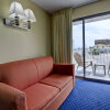Отель Coastal Palms Inn & Suites, фото 2