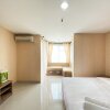 Отель Homey And Simply Studio The Enviro Apartment, фото 15