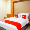 Отель OYO 1740 Tekmira Residence Supratman Syariah, фото 13