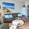 Отель Ostsee Reetdachhaus Nr 3 Südstrand Lodge Marina Bay im Strand Resort, фото 9