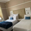 Отель Kwazi Guesthouse, фото 6