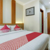 Отель Super OYO Capital O 90291 Vin Stay Petan, фото 5