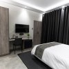 Отель Luxe Suites Boutique Hotel, фото 4