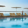 Отель Amwaj Rotana, Jumeirah Beach, фото 25