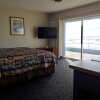 Отель Sandcastle Beachfront Motel, фото 1