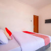 Отель OYO 2728 Sinulingga Residence, фото 4