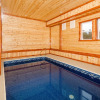 Отель SmokyStays 6 BR Cabin w Indoor Heated Pool, фото 2