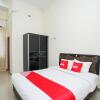 Отель OYO 2968 Cahaya Residence Surabaya Near RSU National Hospital Kota Surabaya, фото 3
