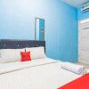 Отель Blue House Costel Syariah by OYO Rooms, фото 10