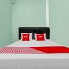 Отель OYO 90571 Dewi Guest House Syariah, фото 6