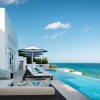 Отель Long Bay Villas - Villa Sea, фото 12