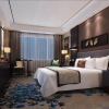 Отель Triumph International Hotel Zhengzhou, фото 3